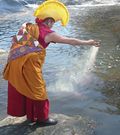 Monk_pouring-_sand_web Monk_pouring-_sand_web