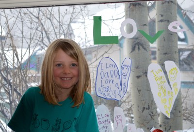 Siri, age 6, builds the wall of love