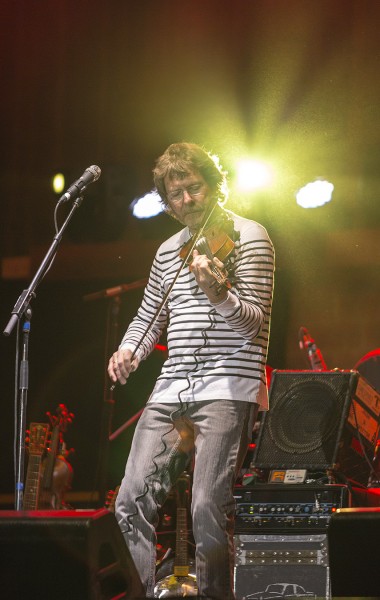 Sam fiddling, while Telluride burns, by Tim Benko