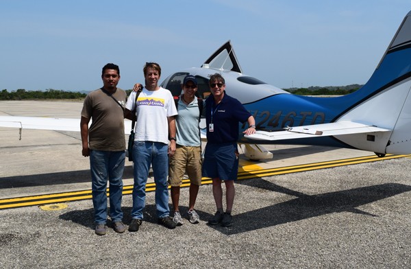 Vinicio Morales of CONAP, Roan McNab of WCS (in a vintage LightHawk tshirt), Armando and John prepare to fly over the MBR.