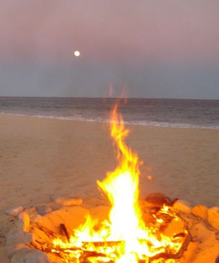 Beach fire moon