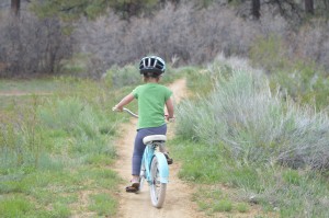 3 year old, Quincy Shoff, lets it fly while biking at Boggy Draw