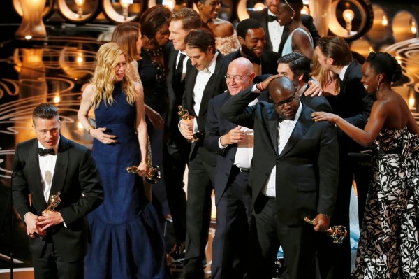 "12 Years a Slave" team after winning Best Pic. (Image, The New York Times)