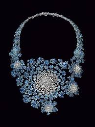 Spectacular necklace patterned on the Julius Set, a mathematical arrangement. Contains 2000 diamonds and sapphires.
