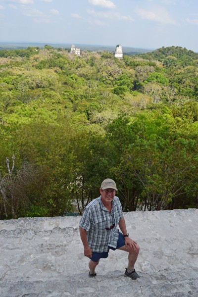 John Pryor atop the highest temple in Tikal. image: Armando Ubeda/LightHawk